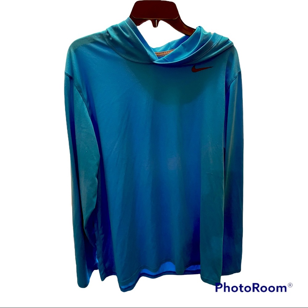 Very good condition. Nike Dry-Fit long sleeve hooded shirt. Mens size Large.